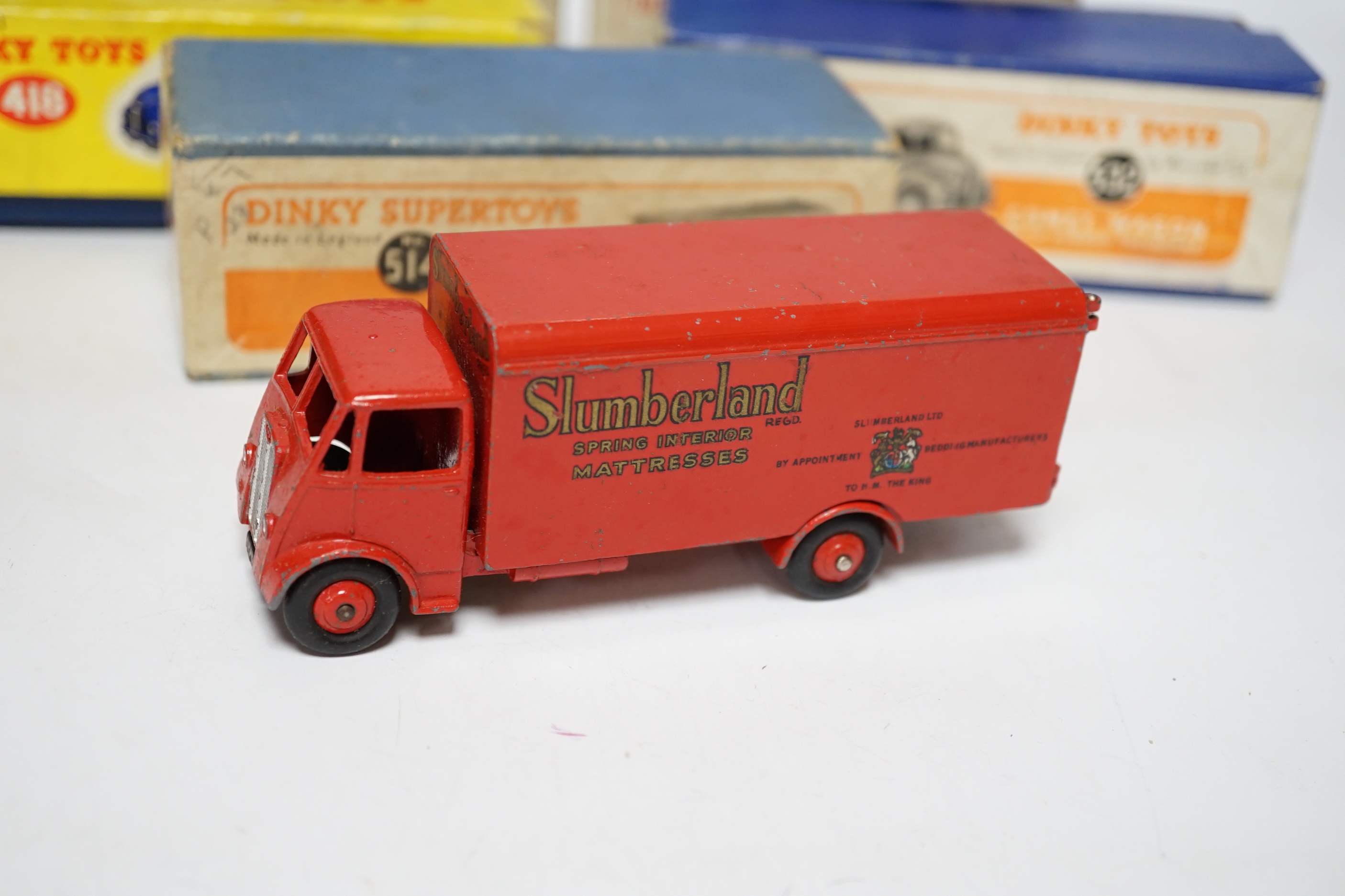 Three boxed Dinky Supertoys; (514) a Guy Slumberland Van, (504) a Foden 14 ton Tanker, and a (532) Comet Wagon with hinged tailboard, together with two useful empty boxes for a second Comet Wagon (418) and a Guy 4 ton Lo